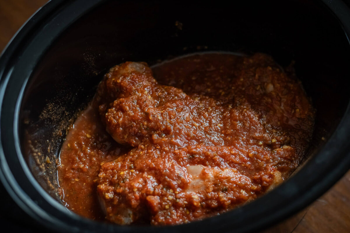 slow cooker salsa chicken before it's cooked.