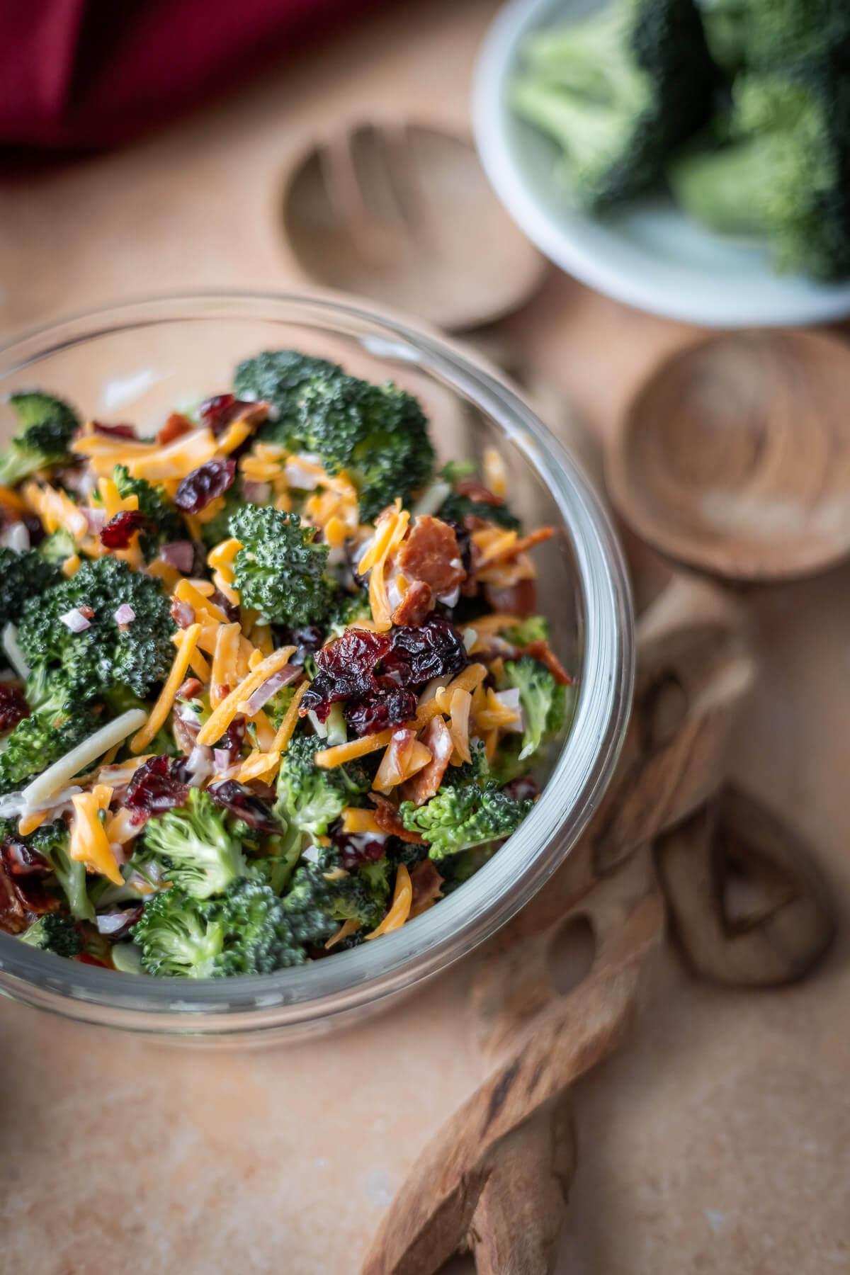 Delicious Raw Broccoli Salad with cheddar cheese, craisins, onions and bacon