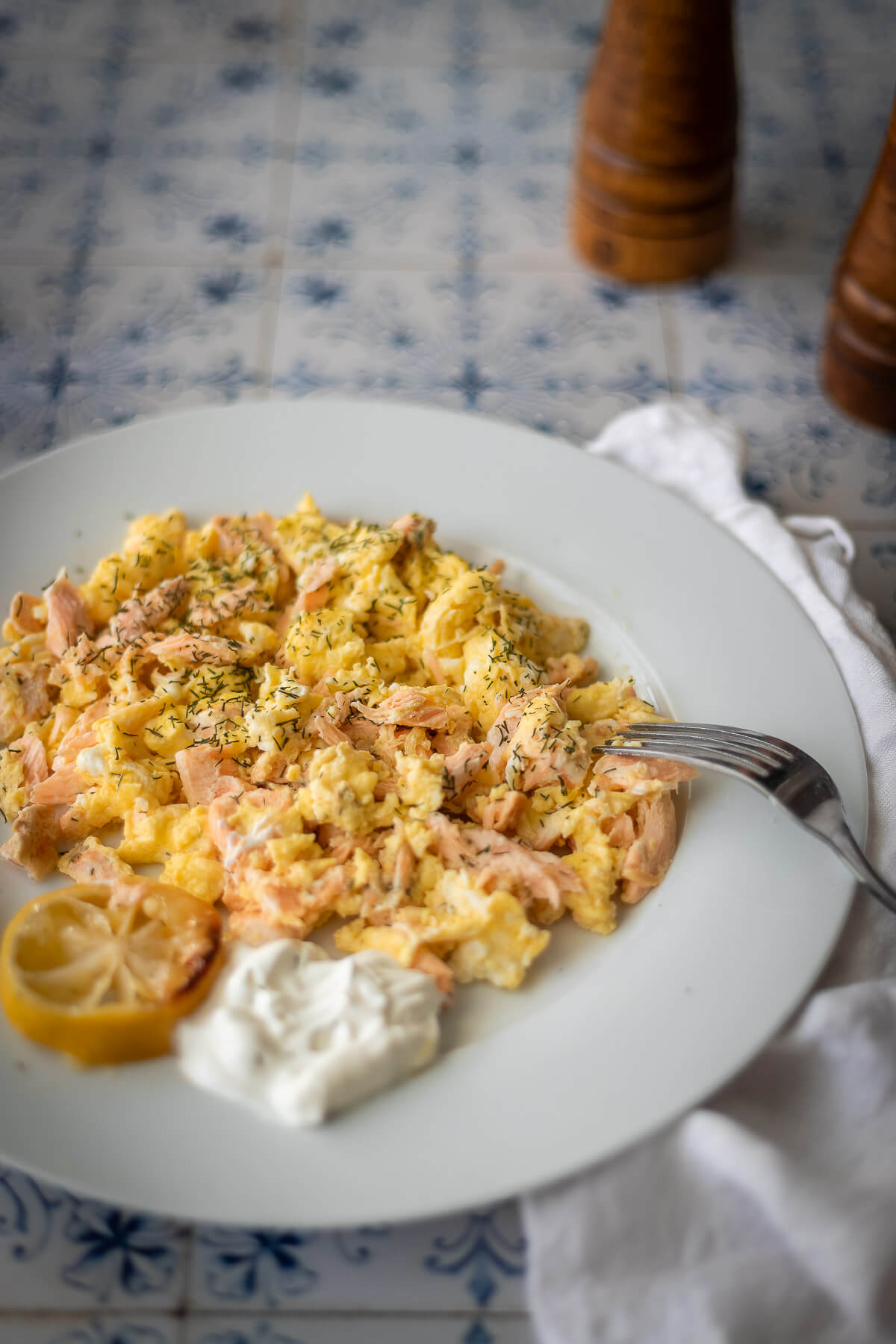 Salmon and Eggs on a plate with with a lemon and dill sauce
