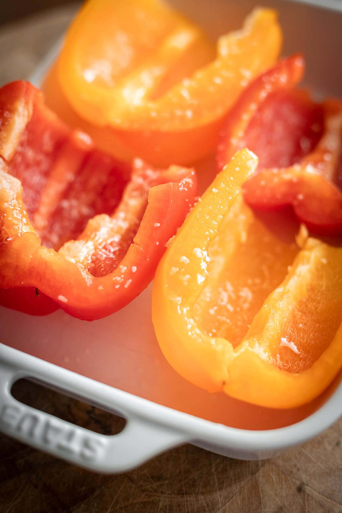 close up view of cut peppers ready to be baked.