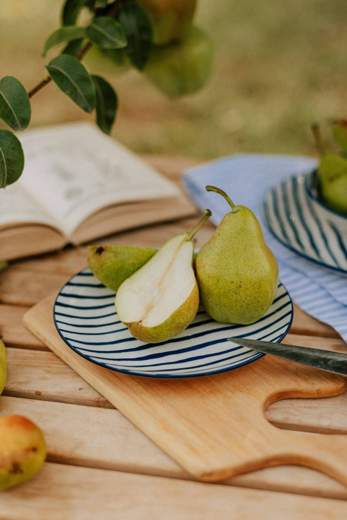 sliced pear on a table outdoors
